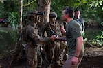 Secretary of War Pete Hegseth meets with U.S. service members at the Jungle Operations Training Center-South in Panama, Aug. 12, 2026.