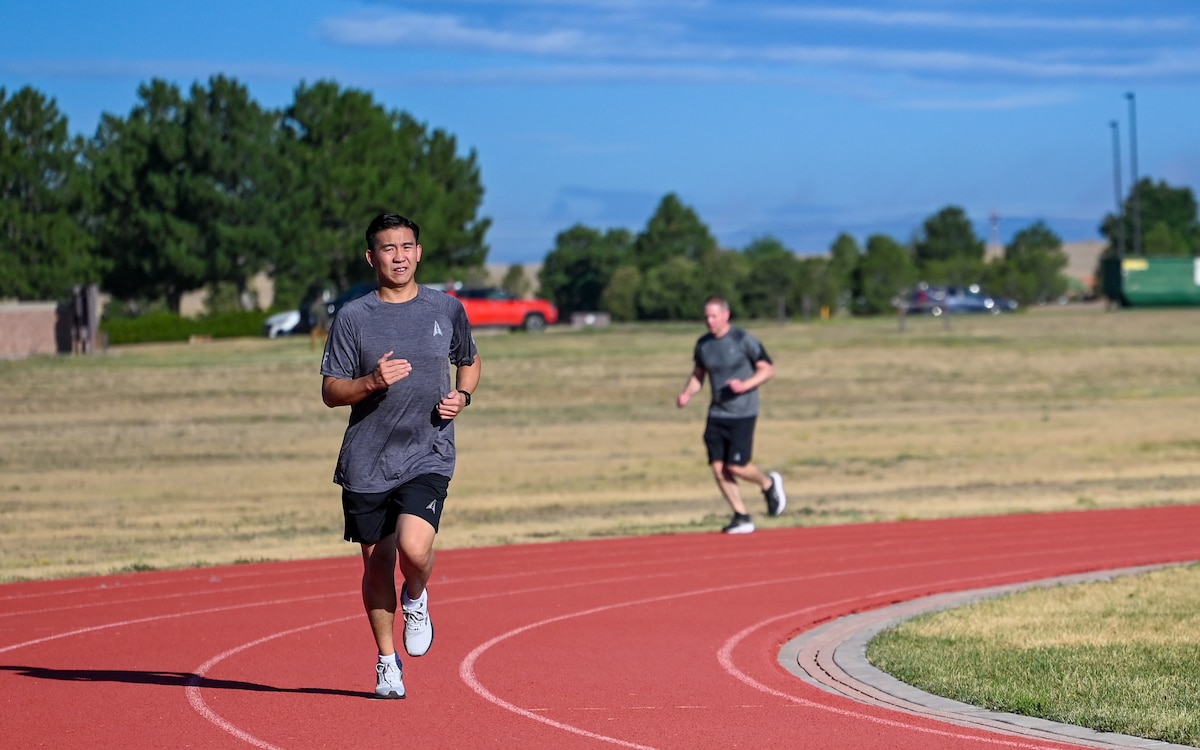 U.S. Space Force Guardians run around the track at Schriever Space Force Base, Co