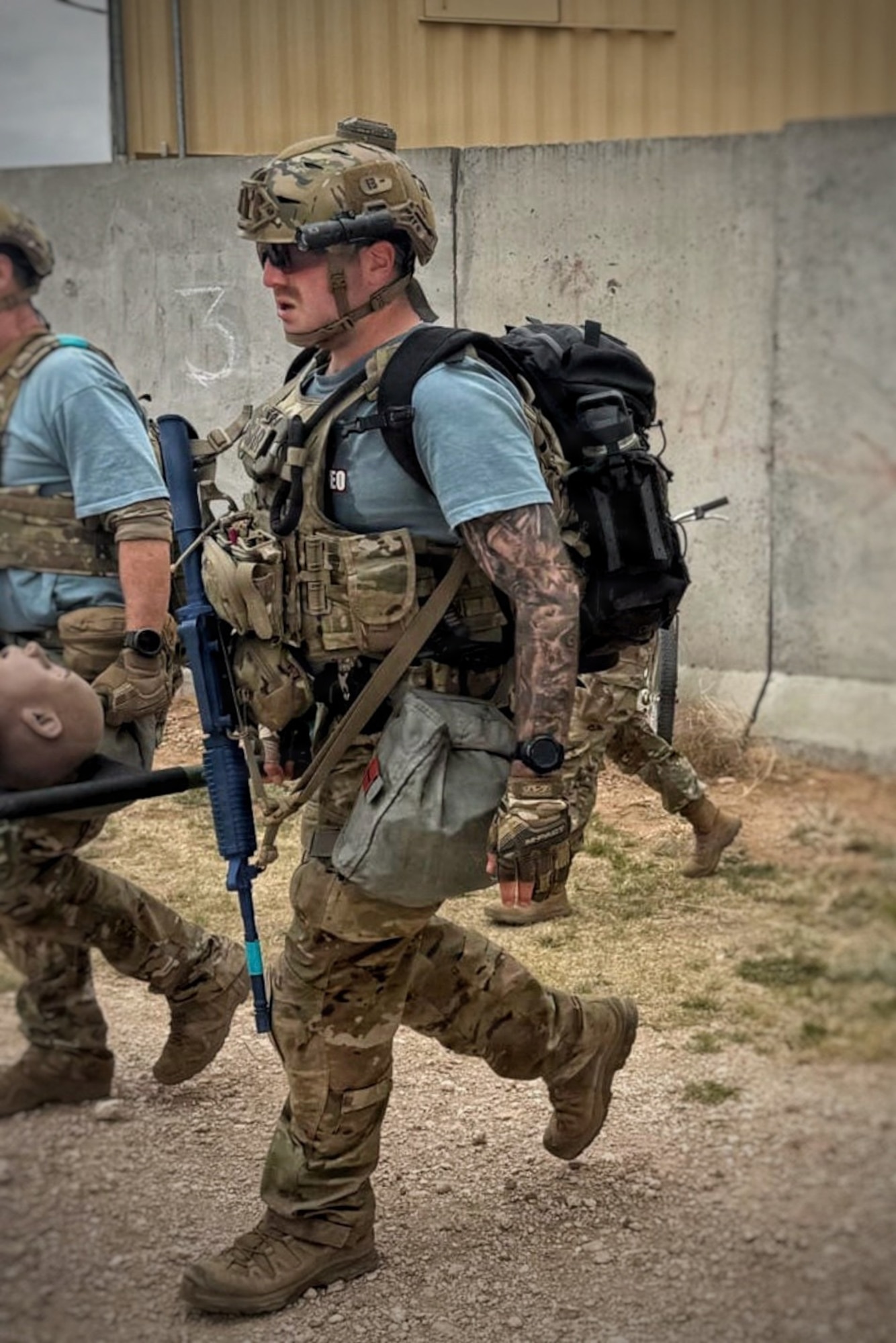 Photo of an Airman holding a weapon.