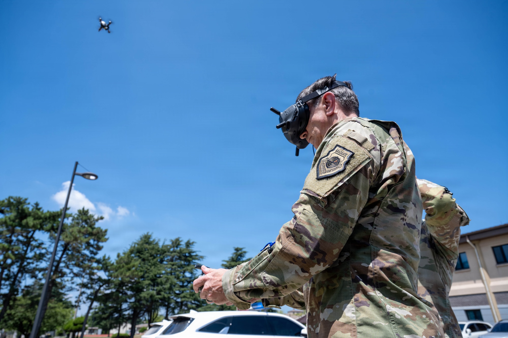 Gen. Schneider flies a small unmanned aerial system.