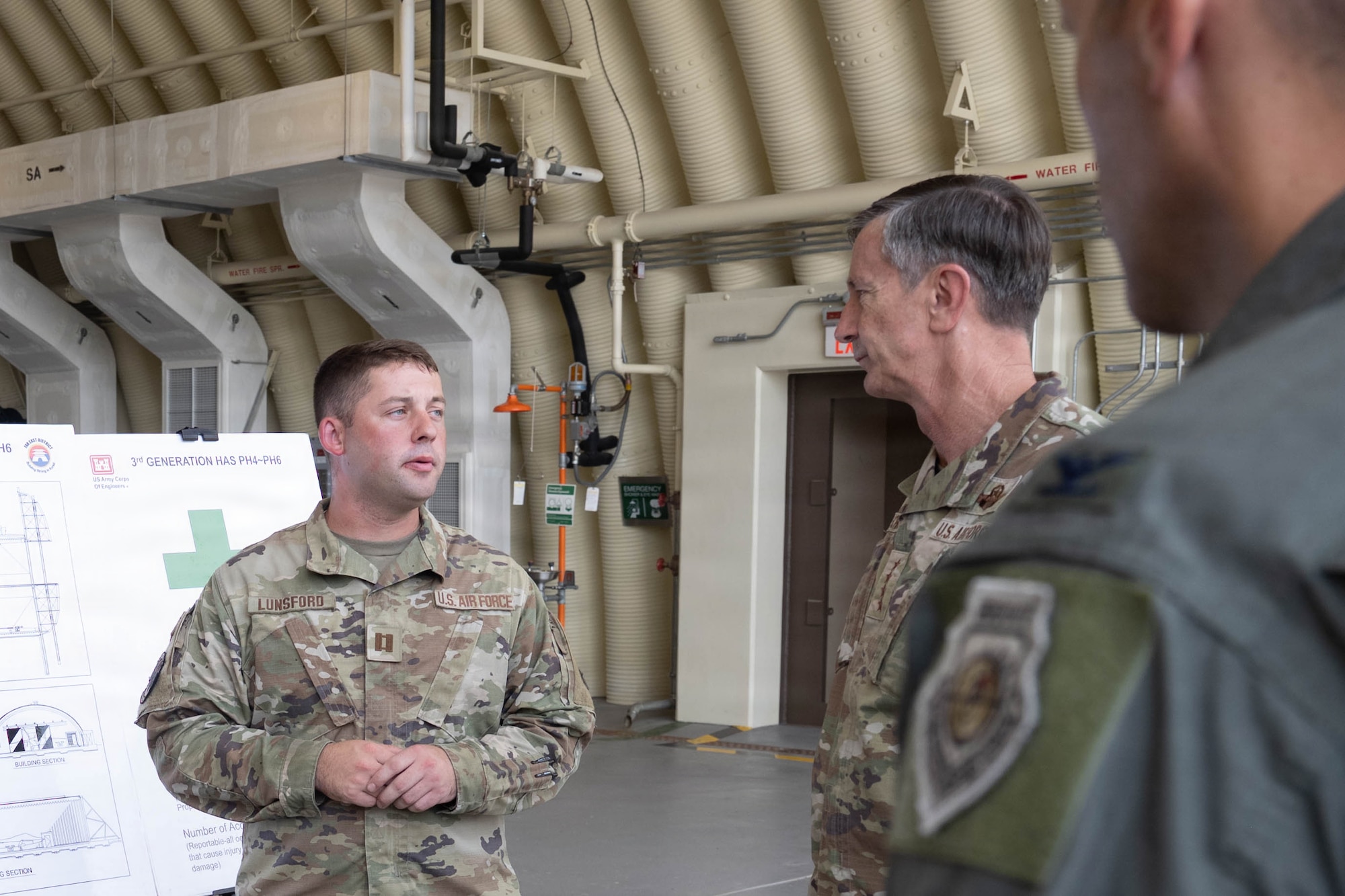 Gen. Schneider receives brief.