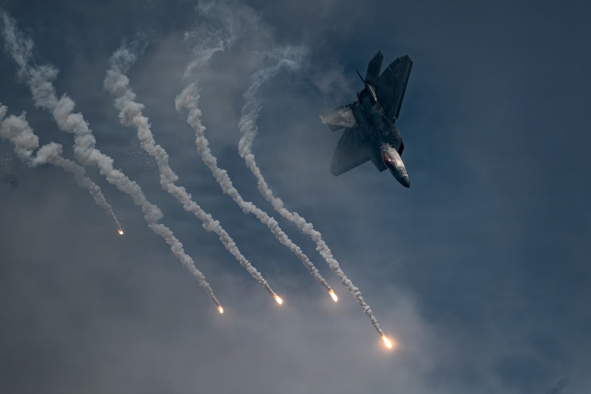 An F-22 Raptor assigned to the Air Force F-22 Raptor Demonstration Team performs during the Arctic Thunder Open House at Joint Base Elmendorf-Richardson, Alaska, Aug. 8, 2026. The team performs precision aerial maneuvers at air shows and open houses worldwide to demonstrate the capabilities of the fifth-generation fighter aircraft. (U.S. Air National Guard photo by Staff Sgt. Joseph Moon)