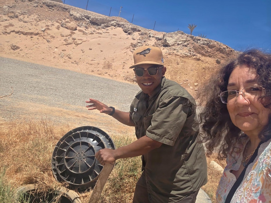 SINAI, Egypt (July 13, 2026) Capt. Wilbert Paige, preventive medicine officer for Multinational Force and Observers, and Alia Zayed, entomology advisor for U.S. Naval Medical Research Unit (NAMRU) EURAFCENT, inspect a concealed area that may serve as a mosquito breeding site during a vector surveillance assessment. Surveillance activities help identify environmental conditions that may contribute to vector-borne disease risks affecting deployed personnel. NAMRU EURAFCENT, part of Navy Medicine Research & Development, conducts research, surveillance and studies of vaccines, therapeutic agents, diagnostic assays and vector control measures in the EUCOM, AFRICOM and CENTCOM Areas of Responsibility to better prevent and treat infectious diseases in support of Navy, Marine Corps and joint U.S. warfighter health, readiness and lethality. (U.S. Navy Courtesy Photo/Released)