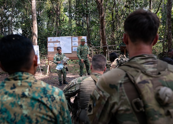 U.S. Army and RBLF personnel learn jungle land navigation basics at Tutong Camp, Brunei Darussalam, Aug. 12, 2026. Oklahoma Army National Guard Soldiers with 1st Squadron, 180th Regiment, 45th Infantry Brigade Combat Team worked alongside 3rd Platoon, Alpha Company, 2nd Battalion, RBLF to develop land navigation skills in a jungle environment as part of Exercise Pahlawan Warrior 26. Exercise Pahlawan Warrior is a biennial bilateral exercise between the U.S. Army Pacific and the RBLF, designed to enhance readiness, interoperability, and strengthen bilateral defense cooperation. (Oklahoma National Guard photo by Sgt. Danielle Rayon)