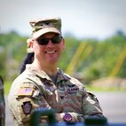 U.S. Army Col. Kevin Potts, commander of the Fort Indiantown Gap garrison, laughs with a colleague during a skeet shooting event at Fort Indiantown Gap, Pennsylvania, Aug. 28, 2025. The firing ranges at Fort Indiantown Gap offer well-maintained venues to host recreational events like this, which was open to all service members and civilians here and allowed them to use their personally-owned firearms. (U.S. Army National Guard photo by Maj. Travis Mueller)