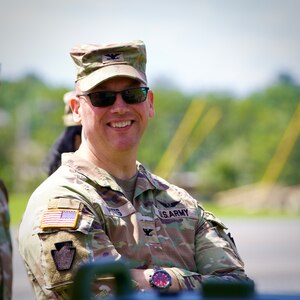 U.S. Army Col. Kevin Potts, commander of the Fort Indiantown Gap garrison, laughs with a colleague during a skeet shooting event at Fort Indiantown Gap, Pennsylvania, Aug. 28, 2025. The firing ranges at Fort Indiantown Gap offer well-maintained venues to host recreational events like this, which was open to all service members and civilians here and allowed them to use their personally-owned firearms. (U.S. Army National Guard photo by Maj. Travis Mueller)