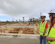 Men is Saipan wearing hats.
