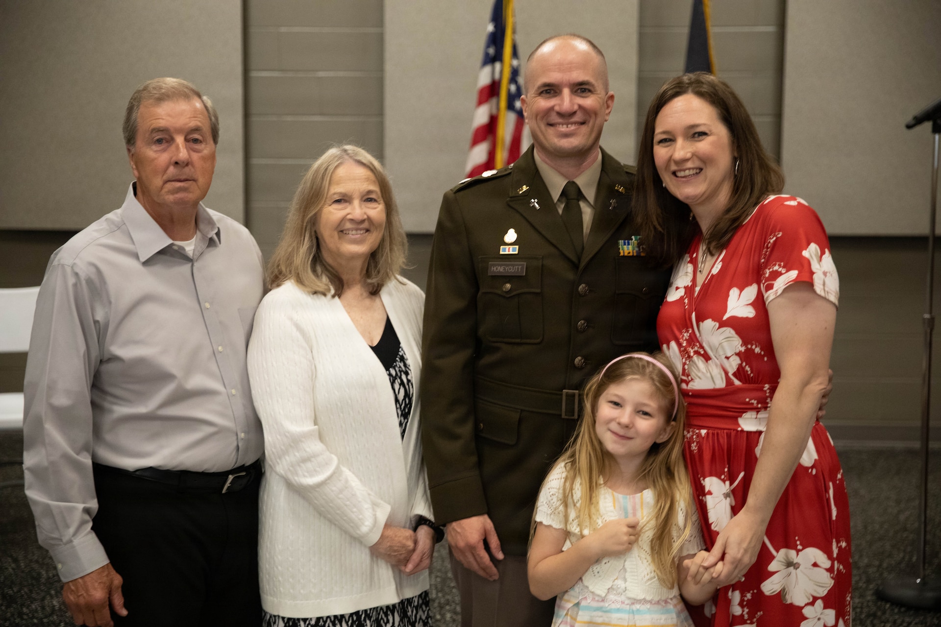 U.S. Army Lt. Col. Eric Honeycutt with his family following a promotion ceremony at Boone National Guard Center in Frankfort, June 24. Family, friends and fellow Soldiers gathered for the ceremony. (U.S. Army National Guard photo by Milt Spalding)