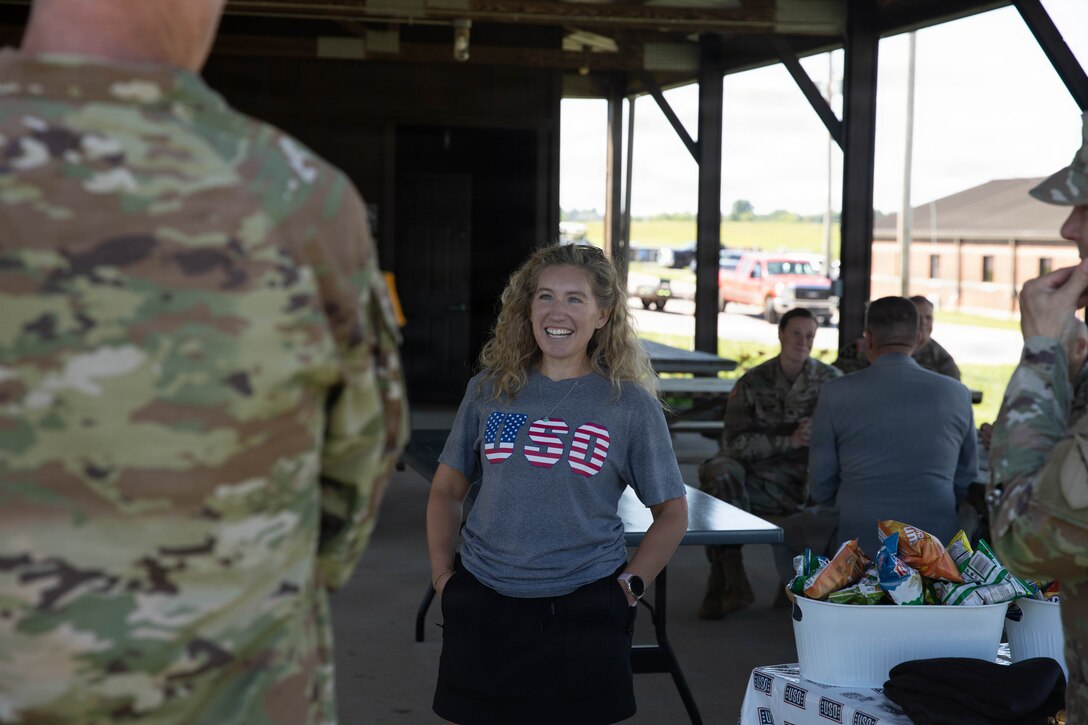 Jen Hansen with USO talks with U.S. Army Brig. Gen. Brian Wertzler during a cookout in honor of the Kentucky National Guard’s 234th birthday at Boone National Guard Center in Frankfort, June 24. Soldiers, Airmen and civilians gathered to celebrate the organization's longstanding tradition of service to the Commonwealth and nation and continued commitment to homeland defense, emergency response and warfighting readiness. (U.S. Army National Guard photo by Milt Spalding)