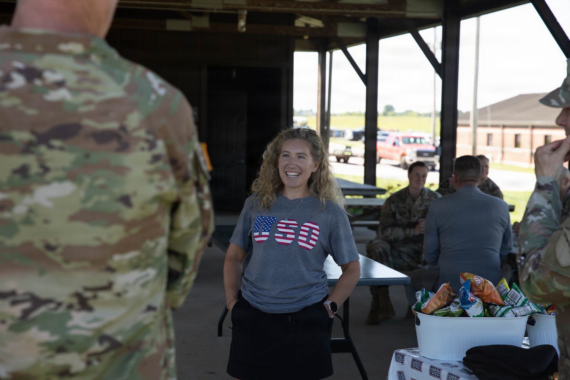 Jen Hansen with USO talks with U.S. Army Brig. Gen. Brian Wertzler during a cookout in honor of the Kentucky National Guard’s 234th birthday at Boone National Guard Center in Frankfort, June 24. Soldiers, Airmen and civilians gathered to celebrate the organization's longstanding tradition of service to the Commonwealth and nation and continued commitment to homeland defense, emergency response and warfighting readiness. (U.S. Army National Guard photo by Milt Spalding)