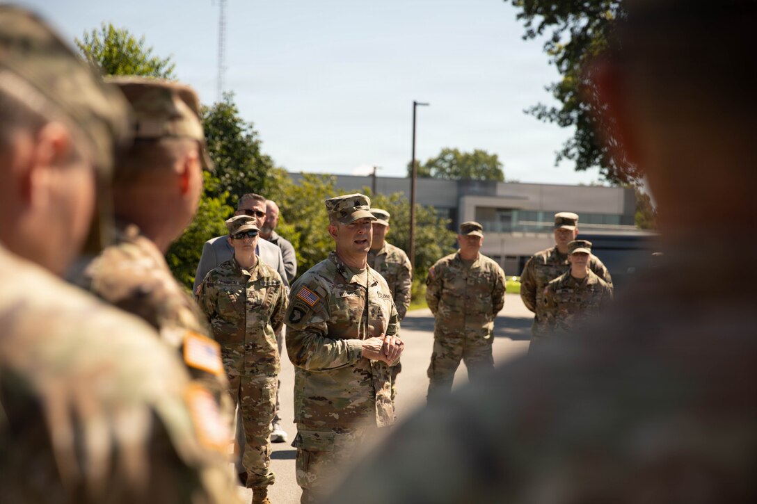 U.S. Army Command Sgt. Maj. Jesse Withers speaks to Soldiers, Airmen and Civilians gathered before a ceremonial cake-cutting during a birthday celebration at Boone National Guard Center in Frankfort, June 24. Soldiers, Airmen and civilians gathered to celebrate the organization's longstanding tradition of service to the Commonwealth and nation and continued commitment to homeland defense, emergency response and warfighting readiness. (U.S. Army National Guard photo by Milt Spalding)