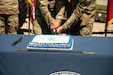 U.S. Army Sgt. Colin Daniel, the youngest Soldier in attendance, and Brig. Gen. Brian Wertzler participate in a ceremonial cake-cutting during a birthday celebration at Boone National Guard Center in Frankfort, June 24. The tradition symbolizes the passing of knowledge, experience and service from one generation of Guardsmen to the next while commemorating the Kentucky National Guard's history of service to the Commonwealth and nation. (U.S. Army National Guard photo by Milt Spalding)
