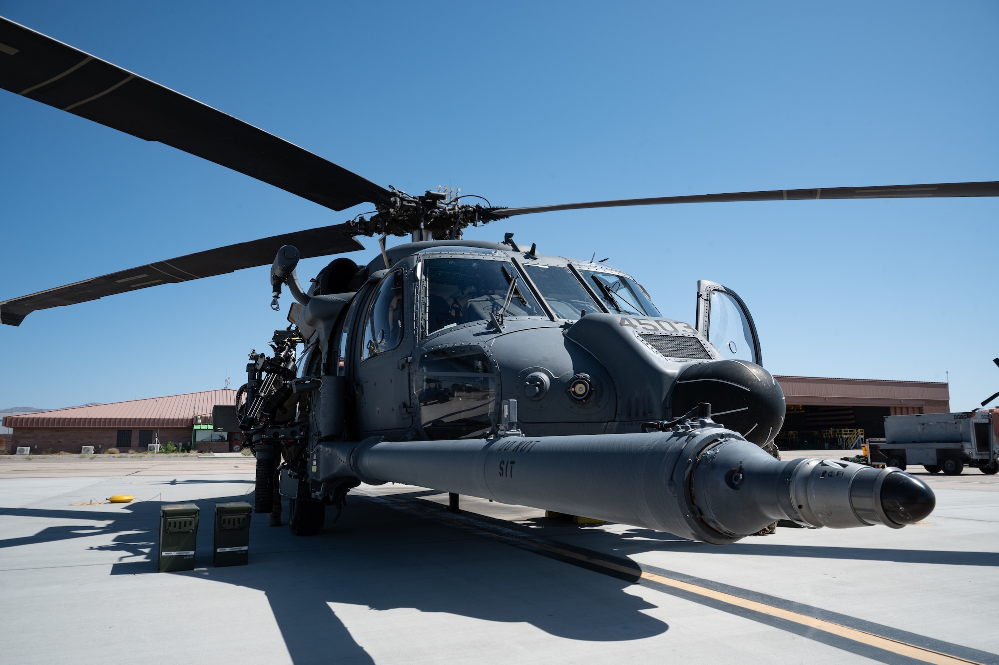A U.S. Air Force HH-60W Jolly Green II assigned to the 88th Test and Evaluation Squadron sits on the flight line prior to a training mission at Nellis Air Force Base, Nevada, May 28, 2025. Recently on Aug. 10, 2026, the 88 TES rapidly generated and deployed two HH-60W Jolly Green II helicopters to rescue five U.S. Navy personnel following an aircraft mishap near Naval Air Weapons Station China Lake, California. (U.S. Air Force photo by Staff Sgt. Jose Miguel T. Tamondong)