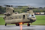 A CH-47F Chinook helicopter assigned to B Company of the 3rd General Support Helicopter Battalion, 126th Aviation Regiment, takes off from the Frederick Douglas Greater Rochester International Airport Sept. 28, 2022, heading for Jacksonville Florida to provide support to the Florida National Guard as Hurricane Ian headed for the state. Two of these helicopters will train with the Canadian Army Reserve at Canadian Forces Base Petawawa from Aug. 20-30. Courtesy photo.
