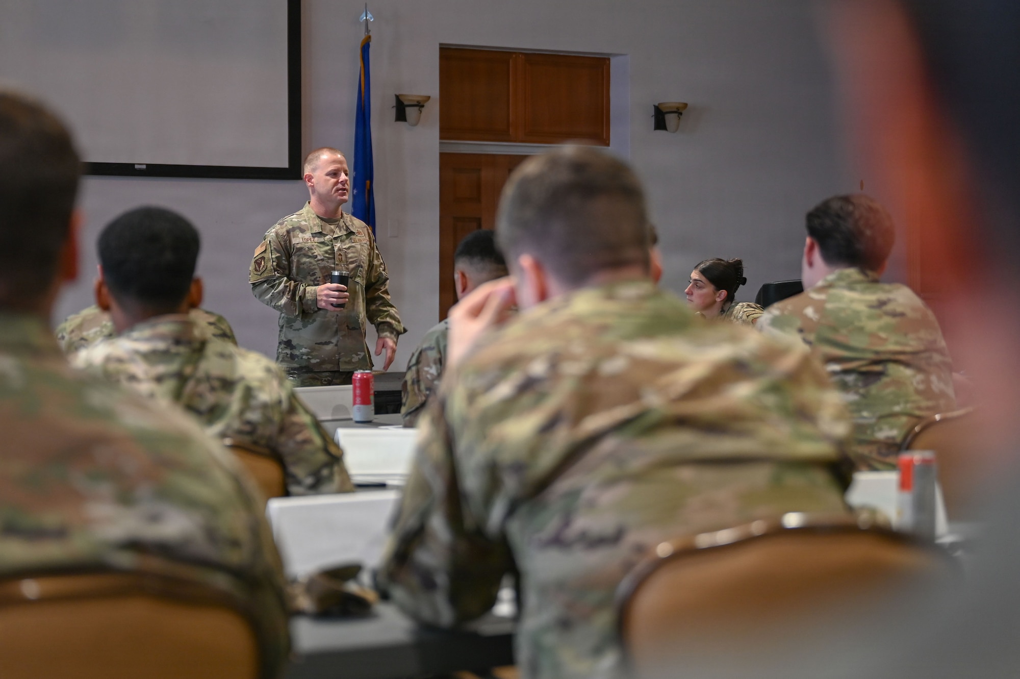 U.S. Air Force Chief Master Sgt. Vincent Lopez, 12th Air Force (Air Forces Southern) senior enlisted leader and class mentor for the Senior Enlisted Noncommissioned Officer Professional Enhancement Seminar, asks students a question during his class introduction at Davis-Monthan Air Force Base, Arizona, Aug. 3, 2026. In one week, SNCO PES students will gain perspectives from senior enlisted leaders with experience across different parts of the Air Force, including career field instructors, helping participants better understand the newest generation of Airmen and how to lead them effectively. (U.S. Air Force photo by Staff Sgt. Kahdija Slaughter)