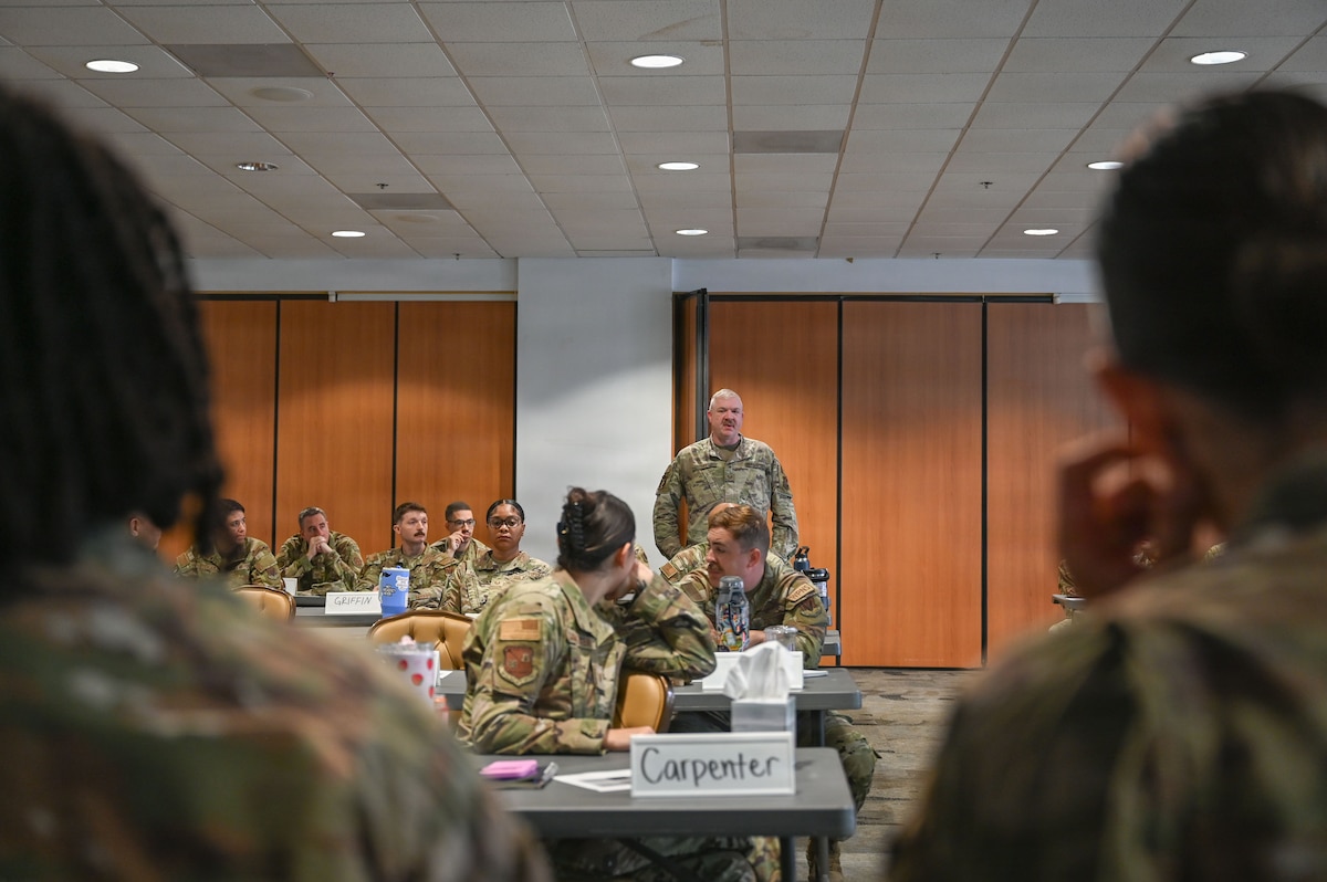 U.S. Air Force Tech. Sgt. Jeffrey Lee, 12th Air Force (Air Forces Southern) weapons safety manager, introduces himself during the Senior Noncommissioned Officer Professional Enhancement Seminar at Davis-Monthan Air Force Base, Arizona, Aug. 3, 2026. More than 30 master sergeants and master sergeant selects attended the orientation of the SNCO PES to gain various leadership tools and operational insight to better lead Airmen, strengthen mission readiness, and support the evolving demands of the force. (U.S. Air Force photo by Staff Sgt. Kahdija Slaughter)