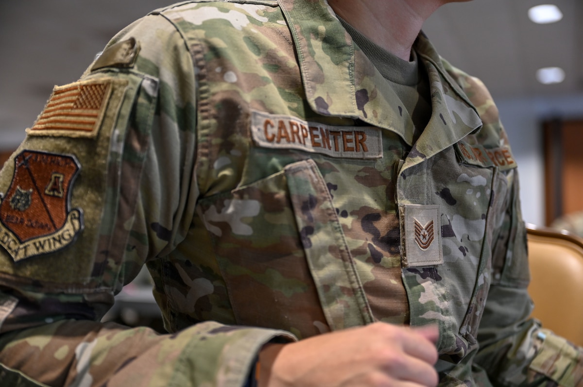 U.S. Air Force Tech. Sgt. Devan Carpenter, University of Arizona AF Reserve Officer Training Course Detachment 020 accessions instructor, introduces herself during the Senior Enlisted Noncommissioned Officer Professional Enhancement Seminar orientation at Davis-Monthan Air Force Base, Arizona, Aug. 3, 2026. The seminar is designed to foster networking and collaboration across units – allowing participants to build relationships with key leaders across the installation. (U.S. Air Force photo by Staff Sgt. Kahdija Slaughter)