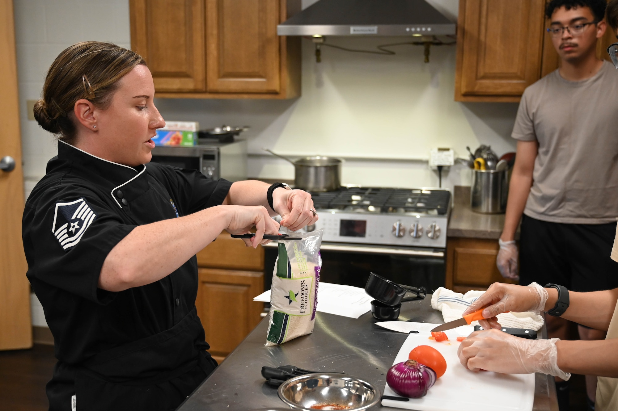People participating in a cooking class.