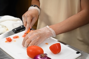 People participating in a cooking class.