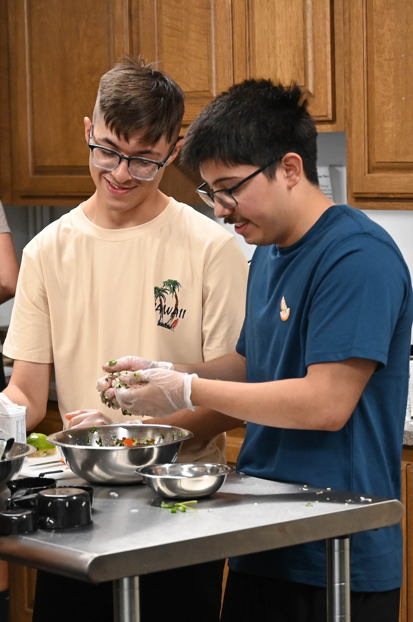 People participating in a cooking class.