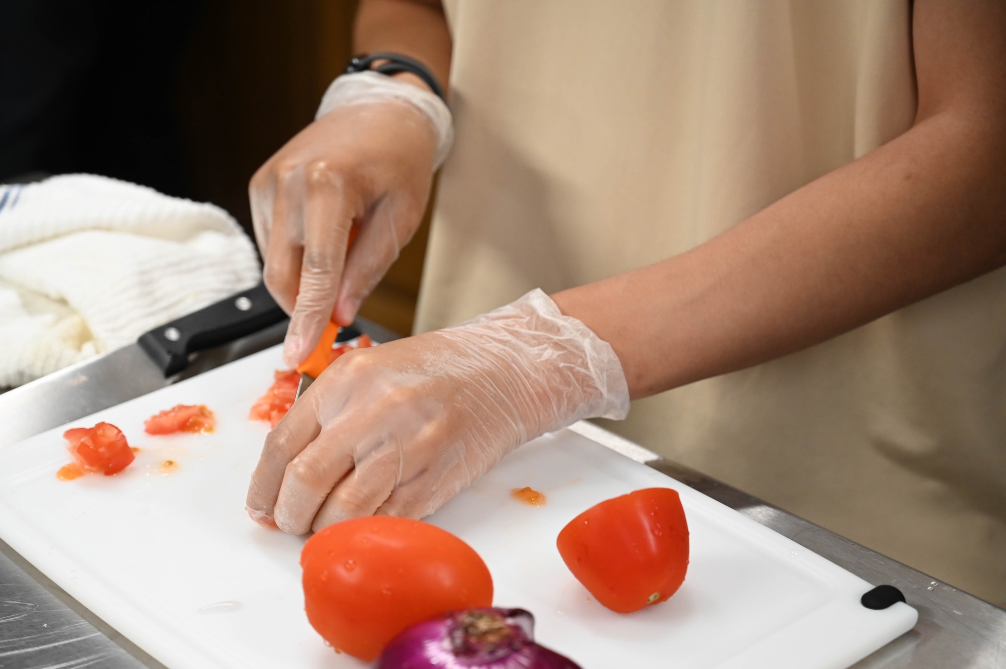 People participating in a cooking class.