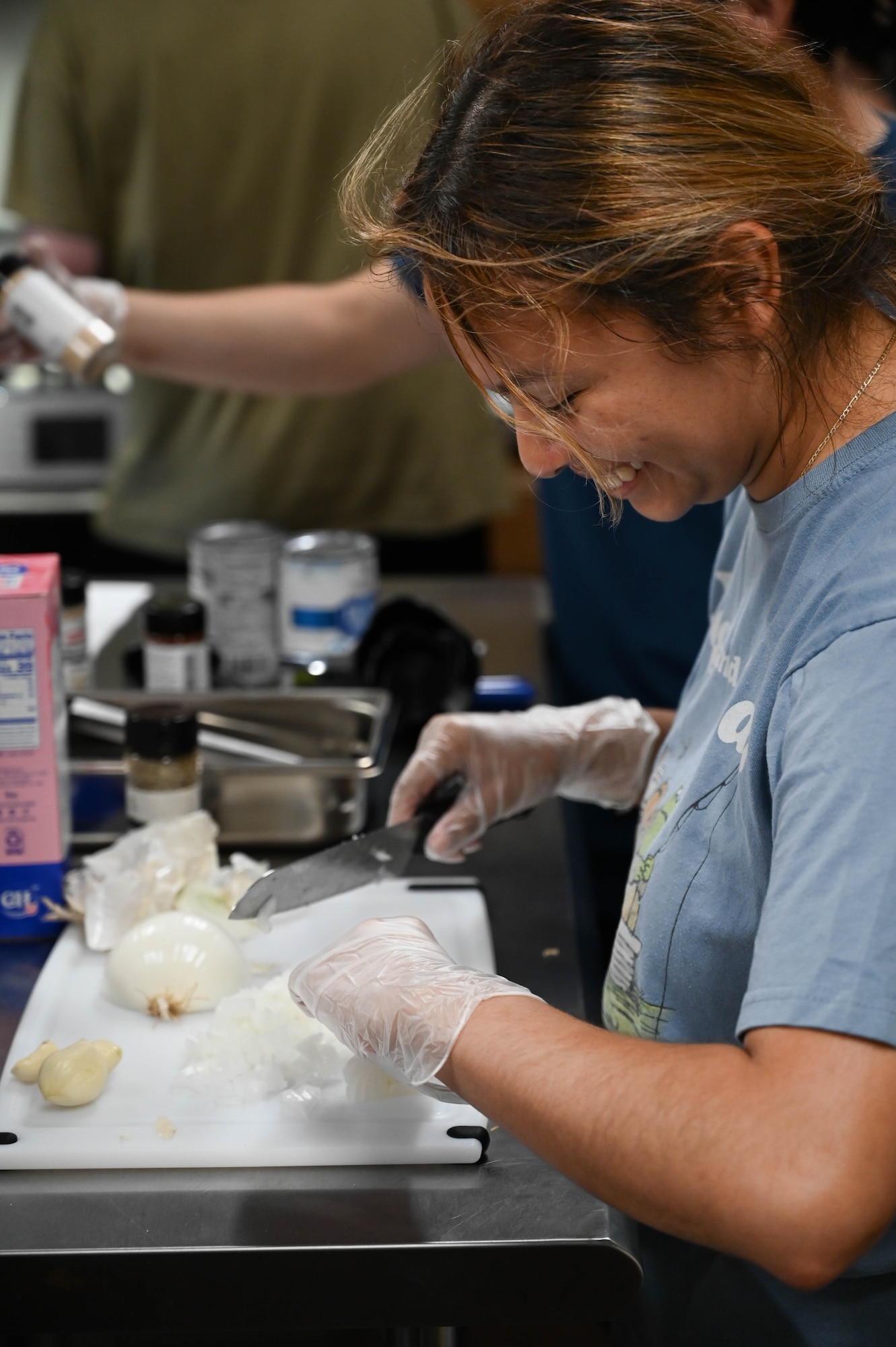 People participating in a cooking class.