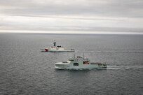 U.S. Coast Guard Cutter Stratton (WMSL 752) and Royal Canadian Navy HMCS Max Bernays (AOPV 432) conduct a combined sail in the Bering Strait, Aug. 11, as part of Operation TUNDRA MERLIN. The combined sail demonstrated the ability of U.S. and Canadian forces to integrate maritime capabilities across the Arctic and reinforced the two nations' longstanding defense partnership. (U.S. Coast Guard Courtesy photo)