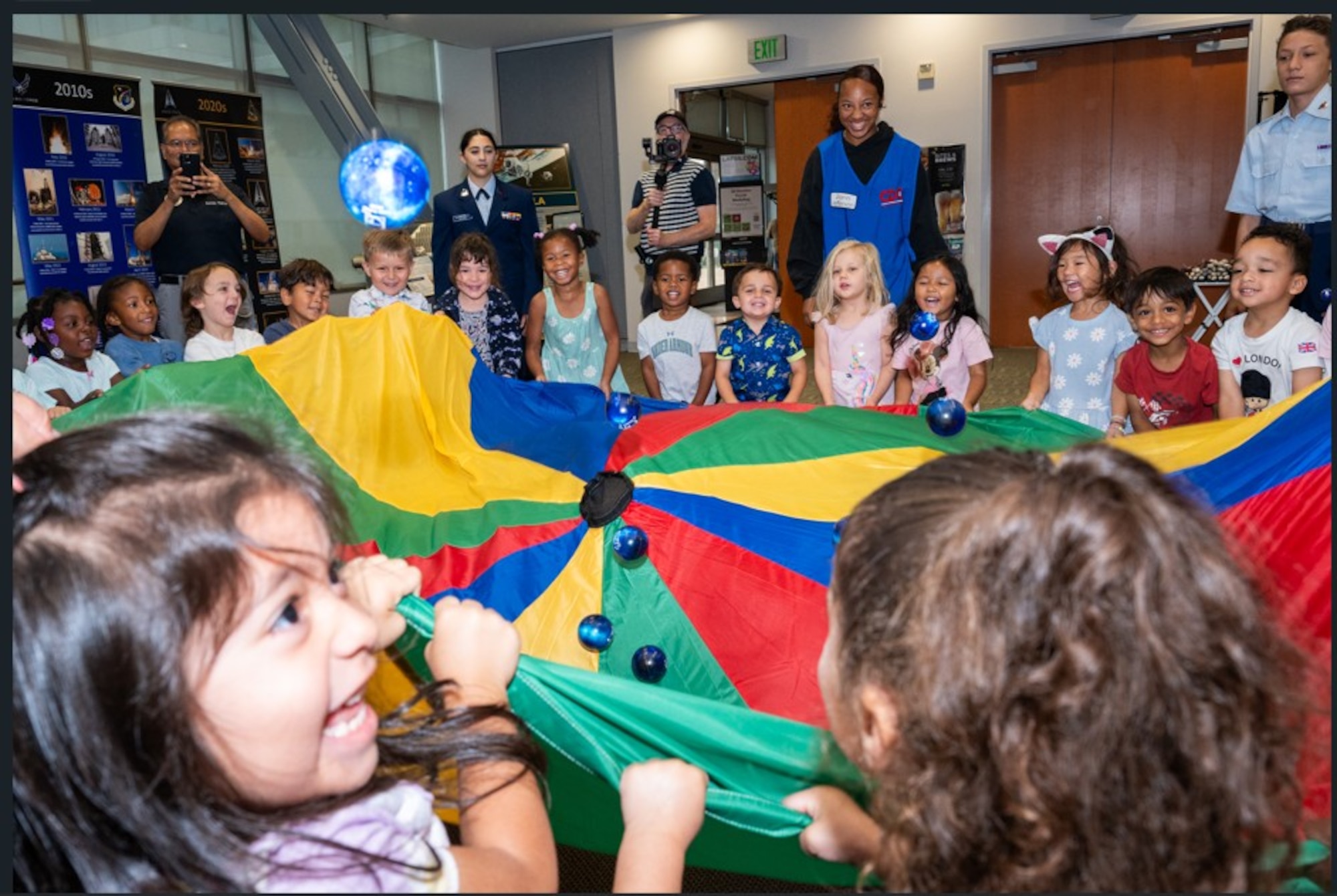 Children participate in a hands-on science activity facilitated by members of the Space Systems Command (SSC) STEM program and volunteers from the Civil Air Patrol as part of SSC’s 5th Anniversary celebration at Los Angeles Air Force Base on Aug. 13, 2026. SSC is the Nation’s premier space acquisition organization responsible for fielding space-based capabilities that protect our Nation’s interests in, from and to space. The command is headquartered at LA AFB with locations throughout the country including space launch operations at Cape Canaveral Space Force Station and Patrick Space Force Base in Fla. and Vandenberg Space Force Base in Calif. (U.S. Space Force photo by Chris Kim)