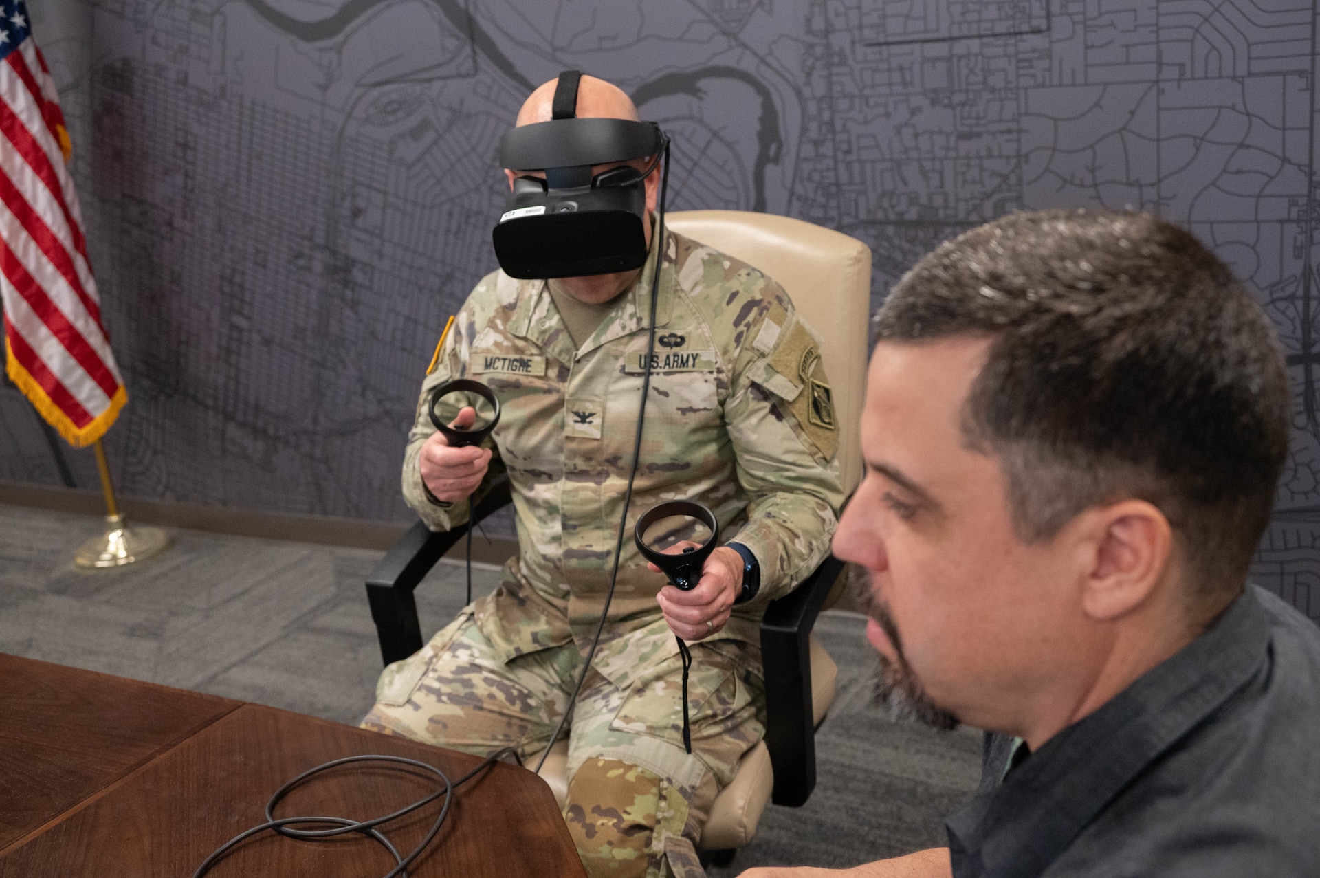 U.S. Army Col. Robert McTighe, commander of the Sacramento District, dons a virtual reality headset as Kevin Russ, USACE Sacramento building information modeling manager, walks the commander through a demonstration of an upcoming real-world project through the view of a virtual reality environment during the “Virtual Reality for Building Information Modeling” presentation in Sacramento, California on Feb. 5, 2026.      

The presentation highlighted how integrating virtual reality and building information modeling enables immersive collaboration, helping teams identify design issues early, improve coordination and deliver U.S. Army Corps of Engineers projects more efficiently. (U.S. Army photo by Bertha Smith, U.S. Army Corps of Engineers Sacramento District Public Affairs)