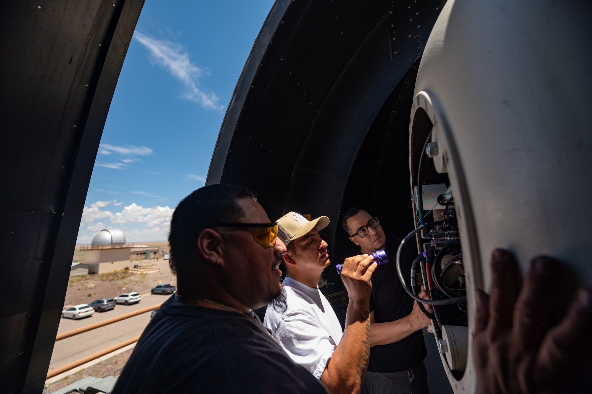 Military and Civilian team members with Mission Delta 2's 15th Space Surveillance Squadron operate and maintain the GEODSS (Ground-Based Electro-Optical Deep Space Surveillance) system at White Sands Missile Range, New Mexico, June 15, 2026. GEODSS rapidly searches for, discovers, and tracks small, dim threats in orbit. One of three locations around the globe, the New Mexico facility was the first to receive the Ground-Based Optical Sensor System (GBOSS) upgrade, which doubles the field of view, doubles the search speed and more than triples the sensitivity of what the U.S. Space Force can see on orbit. A second GEODSS facility in Hawaii completed the GBOSS upgrade in April 2026. The U.S. Space Force's scanning of earth's orbits is now done faster, wider, and clearer than ever before in Medium Earth Orbit (MEO), Geostationary Orbit (GEO), High Earth Orbit (HEO) and cislunar orbits. These enhancements demonstrate the Space Force's investments in modern technologies rapidly transitioned to the warfighter to maintain an asymmetric advantage across the continuum of conflict.  (U.S. Space Force photo by Dave Grim)