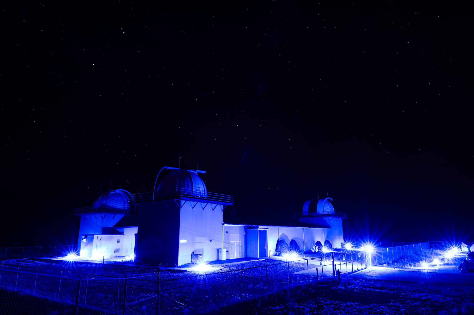 Military and Civilian team members with Mission Delta 2's 15th Space Surveillance Squadron operate and maintain the GEODSS (Ground-Based Electro-Optical Deep Space Surveillance) system at White Sands Missile Range, New Mexico, June 15, 2026. GEODSS rapidly searches for, discovers, and tracks small, dim threats in orbit. One of three locations around the globe, the New Mexico facility was the first to receive the Ground-Based Optical Sensor System (GBOSS) upgrade, which doubles the field of view, doubles the search speed and more than triples the sensitivity of what the U.S. Space Force can see on orbit. A second GEODSS facility in Hawaii completed the GBOSS upgrade in April 2026. The U.S. Space Force's scanning of earth's orbits is now done faster, wider, and clearer than ever before in Medium Earth Orbit (MEO), Geostationary Orbit (GEO), High Earth Orbit (HEO) and cislunar orbits. These enhancements demonstrate the Space Force's investments in modern technologies rapidly transitioned to the warfighter to maintain an asymmetric advantage across the continuum of conflict.  (U.S. Space Force photo by Dave Grim)