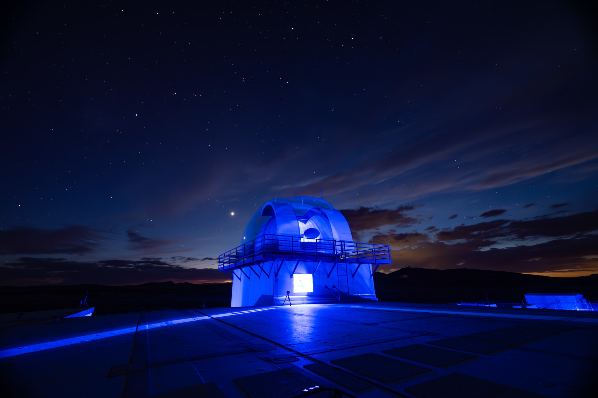 Military and Civilian team members with Mission Delta 2's 15th Space Surveillance Squadron operate and maintain the GEODSS (Ground-Based Electro-Optical Deep Space Surveillance) system at White Sands Missile Range, New Mexico, June 15, 2026. GEODSS rapidly searches for, discovers, and tracks small, dim threats in orbit. One of three locations around the globe, the New Mexico facility was the first to receive the Ground-Based Optical Sensor System (GBOSS) upgrade, which doubles the field of view, doubles the search speed and more than triples the sensitivity of what the U.S. Space Force can see on orbit. A second GEODSS facility in Hawaii completed the GBOSS upgrade in April 2026. The U.S. Space Force's scanning of earth's orbits is now done faster, wider, and clearer than ever before in Medium Earth Orbit (MEO), Geostationary Orbit (GEO), High Earth Orbit (HEO) and cislunar orbits. These enhancements demonstrate the Space Force's investments in modern technologies rapidly transitioned to the warfighter to maintain an asymmetric advantage across the continuum of conflict.  (U.S. Space Force photo by Dave Grim)