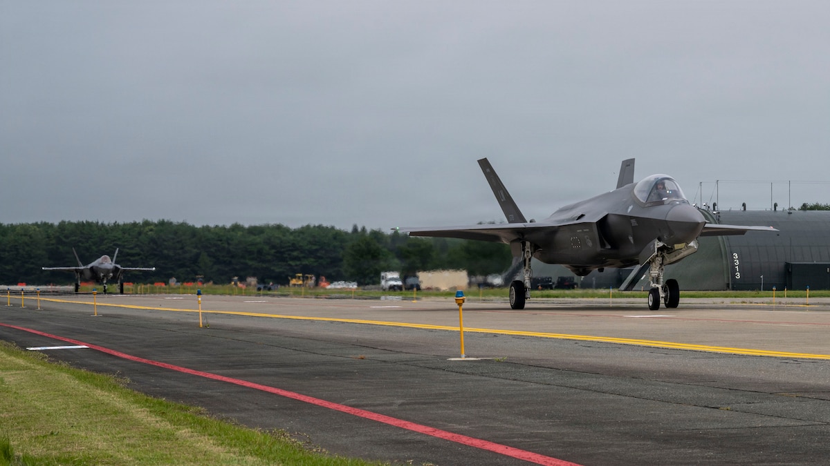 Two U.S. Air Force F-35A Lightning IIs assigned to the 13th Fighter Squadron taxi at Misawa Air Base, Japan, July 29, 2026.
