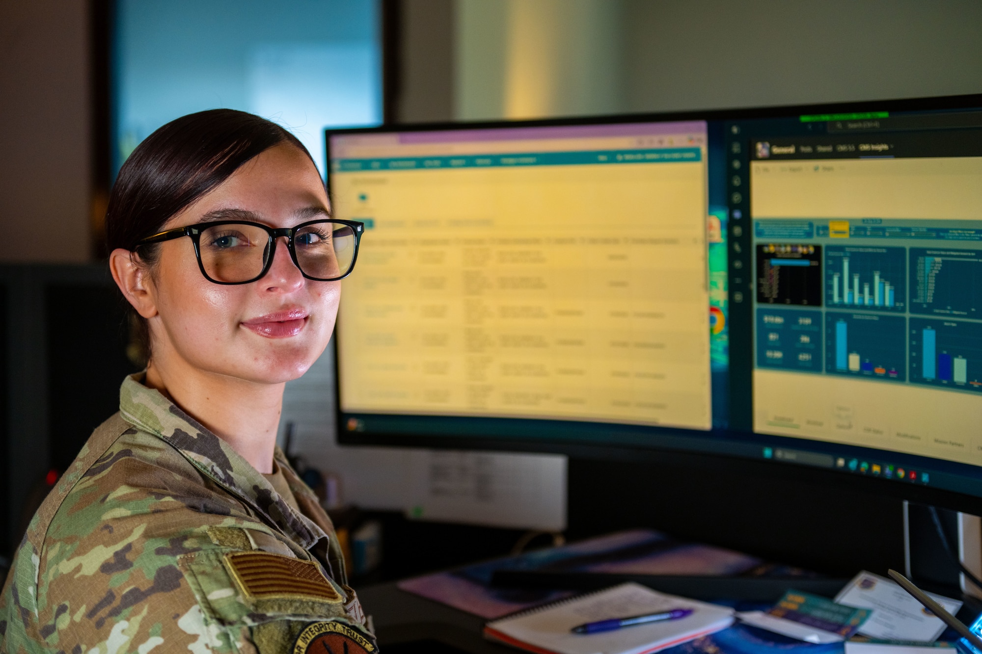 A woman works on a computer.