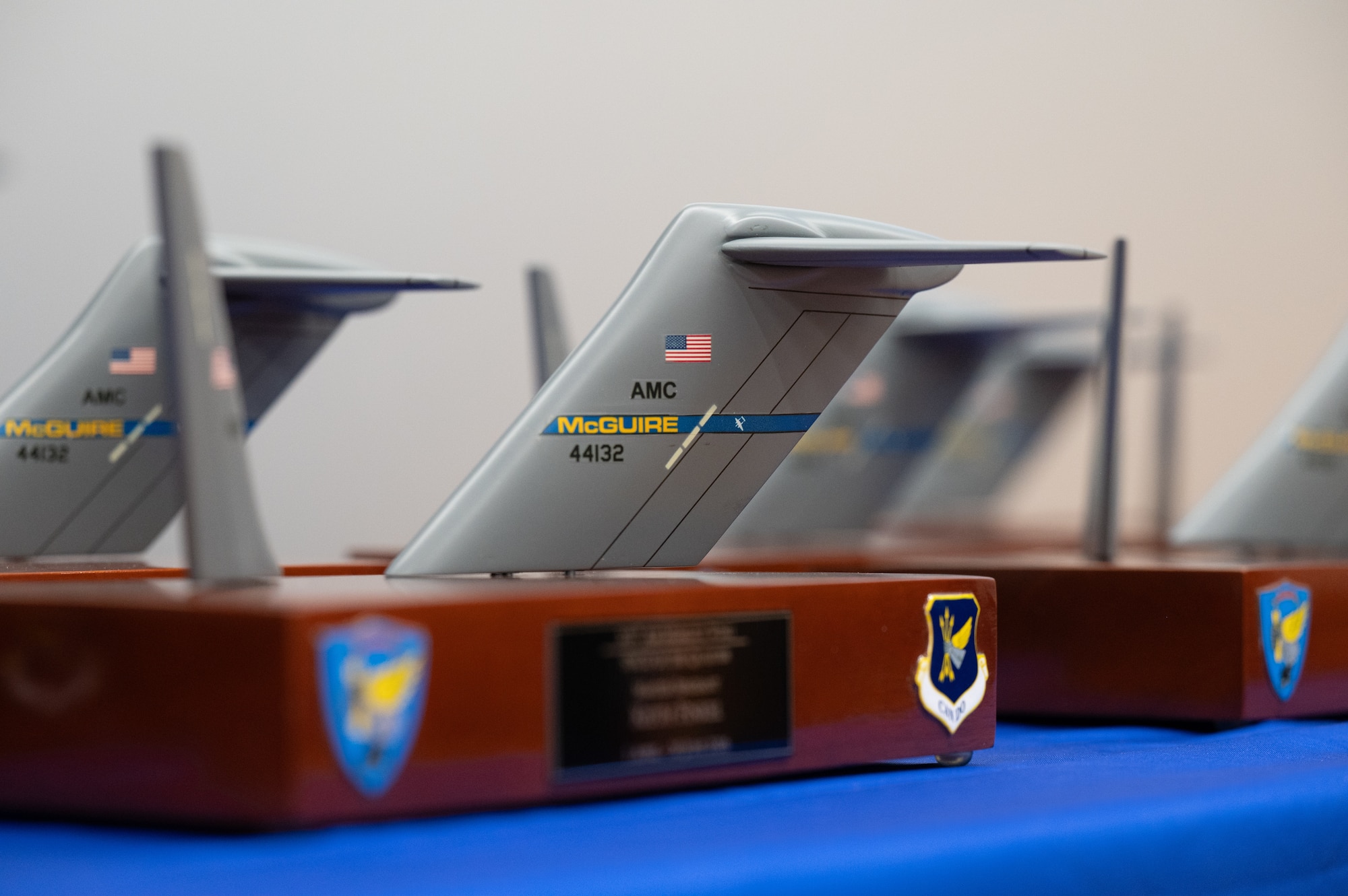 Awards sit on a table during the 305th Air Mobility Wing Quarterly Awards Ceremony at Joint Base McGuire-Dix-Lakehurst, N.J., Aug. 10, 2026.