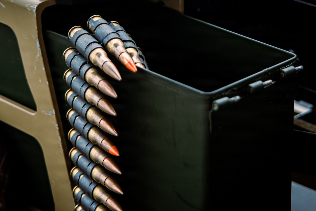 7.62mm rounds are staged for firing during M240B machine gun familiarization training on the flight deck of San Antonio-class amphibious transport dock USS Portland (LPD 27) in the U.S. Central Command area of responsibility, August 14, 2026.