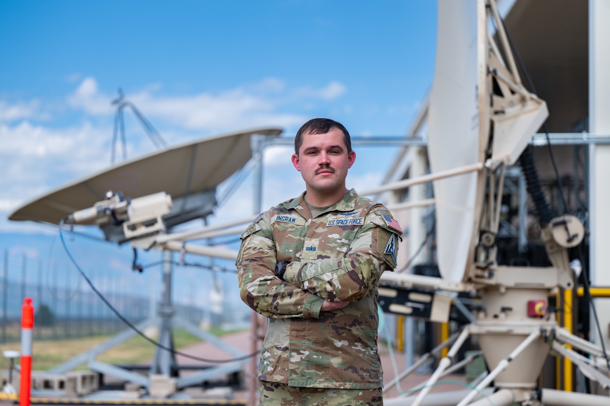 Specialist 4 Jonathan Ingram has earned the prestigious 2025 American Legion Spirit of Service Award, a national honor recognizing his dual-front impact: safeguarding the nation's space domain and serving his local community. Ingram, a Guardian assigned to U.S. Space Forces Combat Forces Command, was selected from across the armed forces for his extraordinary commitment to volunteerism and service that reflects the highest credit upon the U.S. Space Force. (U.S. Space Force photo by David Grim)