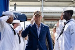 The Honorable Pete Hegseth, Secretary of War, salutes the side boys when coming aboard the Arleigh Burke-class guided-missile destroyer USS Gridley (DDG 101) while pier side in Panama City, Panama Aug. 13, 2026. U.S. military forces are deployed to the U.S. Southern Command area of responsibility in support of Joint Task Force Western Hemisphere, Department of War-directed operations, and the President’s priorities to disrupt illicit drug trafficking, deter malign actors and protect the homeland through continuous presence. (U.S. Navy photo)
