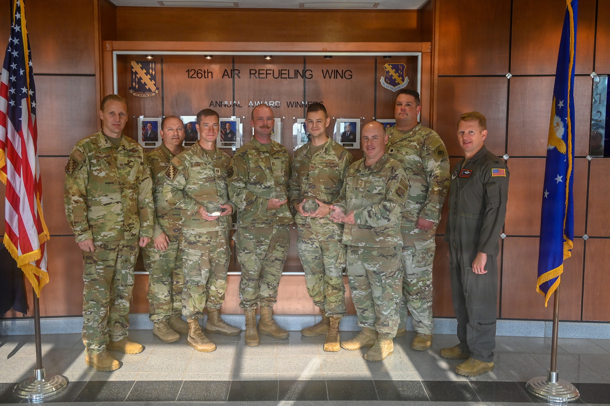 Airman lined up posing for a photo.