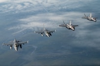 U.S. Air Force F-16 Fighting Falcons and F-35A Lightning IIs conduct sorties over the Joint Pacific Alaska Range Complex near Eielson Air Force Base, Alaska, Aug. 13, 2026.  This flight gave Gen. Gregory Guillot, , commander of the North American Aerospace Defense Command (NORAD) and U.S. Northern Command (USNORTHCOM), and Danish Gen. Michael Hylegaard, Chief of Defense, a firsthand look at Alaska's unique training environment, preparing U.S. and allied forces to operate in extreme cold-weather conditions while advancing security and cooperation in the Arctic. (U.S. Air Force photos by Senior Airman Tori Haudenschild)