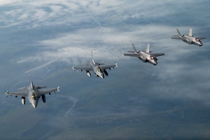 U.S. Air Force F-16 Fighting Falcons and F-35A Lightning IIs conduct sorties over the Joint Pacific Alaska Range Complex near Eielson Air Force Base, Alaska, Aug. 13, 2026.  This flight gave Gen. Gregory Guillot, , commander of the North American Aerospace Defense Command (NORAD) and U.S. Northern Command (USNORTHCOM), and Danish Gen. Michael Hylegaard, Chief of Defense, a firsthand look at Alaska's unique training environment, preparing U.S. and allied forces to operate in extreme cold-weather conditions while advancing security and cooperation in the Arctic. (U.S. Air Force photos by Senior Airman Tori Haudenschild)