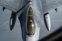 Gen. Gregory Guillot, commander of the North American Aerospace Defense Command (NORAD) and U.S. Northern Command (USNORTHCOM), and Maj. Harrison Gebs, 18th Fighter Interceptor Squadron commander, frontseat, conducts sorties in an F-16 Fighting Falcon over the Joint Pacific Alaska Range Complex near Eielson Air Force Base, Alaska, Aug. 13, 2026. This flight allowed Guillot to observe the unique cold weather capabilities, joint training environments and defense infrastructure in the Alaskan NORAD region, while strengthening bilateral defense cooperation in the Arctic. (U.S. Air Force photo by Senior Airman Tori Haudenschild)
