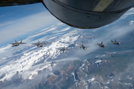 U.S. Air Force F-35A Lightning IIs, F-16 Fighting Falcons, and F-22A Raptors conduct sorties over the Joint Pacific Alaska Range Complex near Eielson Air Force Base, Alaska, Aug. 13, 2026.  This flight gave Gen. Gregory Guillot, , commander of the North American Aerospace Defense Command (NORAD) and U.S. Northern Command (USNORTHCOM), Chief of Defense, a firsthand look at Alaska's unique training environment, preparing U.S. and allied forces to operate in extreme cold-weather conditions while advancing security and cooperation in the Arctic. (U.S. Air Force photos by Senior Airman Tori Haudenschild)