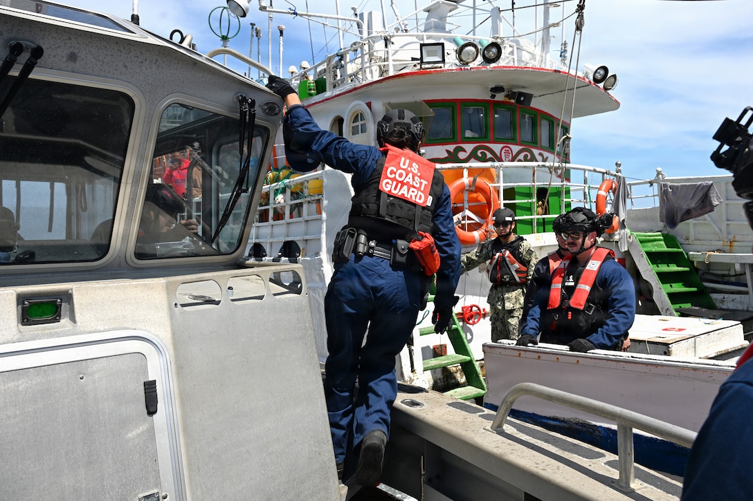 A U.S. Coast Guard boarding team from the Legend-class cutter Midgett (WMSL 757) prepares to transfer from the cutter’s long-range interceptor small boat to conduct a law enforcement boarding of a fishing vessel under Regional Fisheries Management Organizations (RFMO) authority in the Pacific Ocean, July 1, 2026. RFMO boardings ensure compliance with international fisheries regulations and counter illegal, unregulated and unreported fishing in the Pacific Ocean. (U.S. Coast Guard Photo by Petty Officer 3rd Class Austin Wiley)