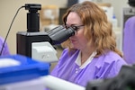 A medical laboratory technician examines a sample under a microscope in the Carl R. Darnall Army Medical Center Laboratory. The laboratory team works behind the scenes to identify and analyze specimens that help providers make informed decisions about patient care.