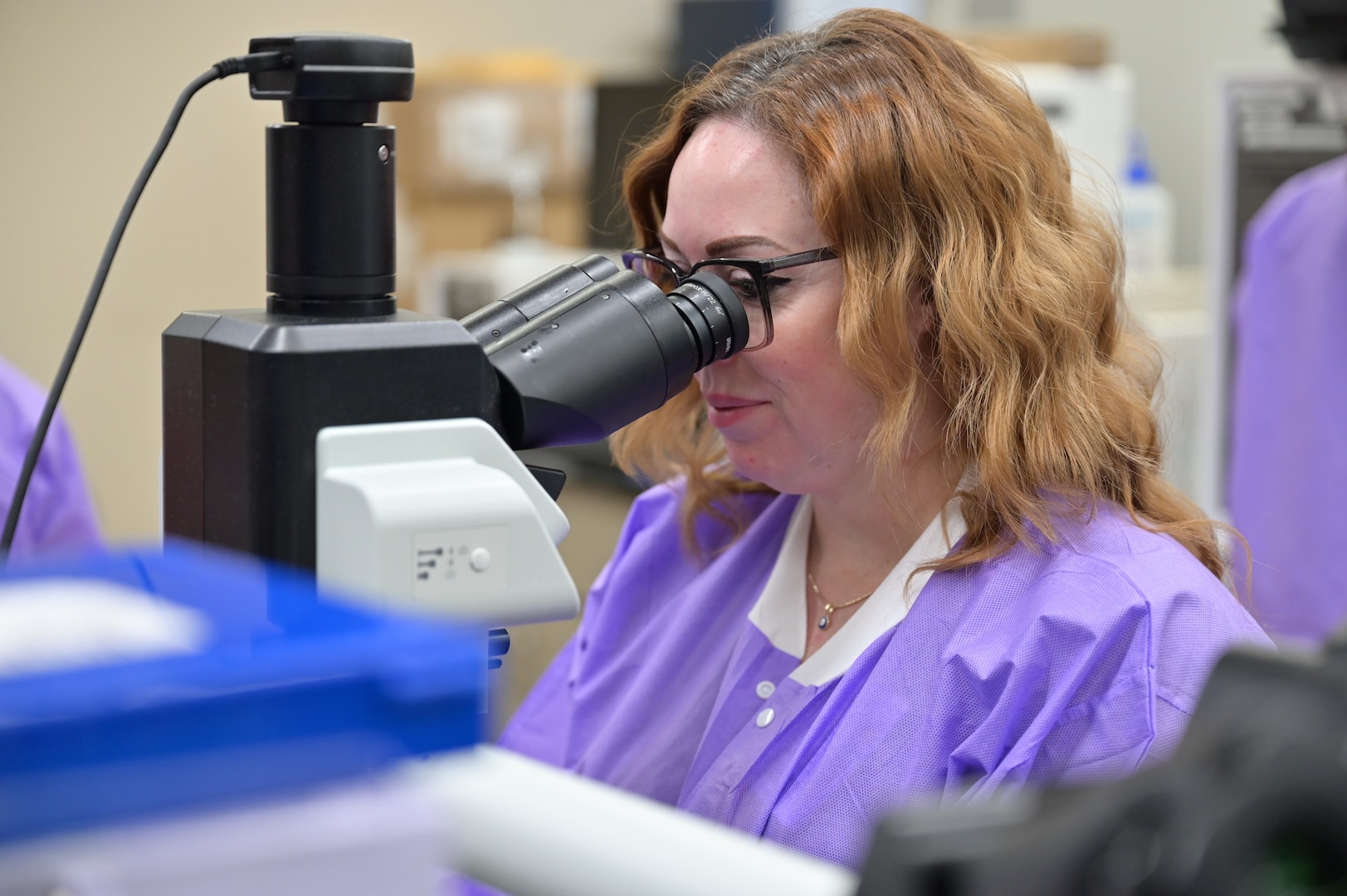 A medical laboratory technician examines a sample under a microscope in the Carl R. Darnall Army Medical Center Laboratory. The laboratory team works behind the scenes to identify and analyze specimens that help providers make informed decisions about patient care.