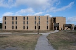 One of two newly renovated technical training dormitories stands at Joint Base San Antonio-Lackland, Texas, Aug. 12, 2026. Buildings 10652 and 10804 underwent renovations to modernize major building systems and improve infrastructure supporting the 37th Training Wing’s training mission. A ribbon-cutting ceremony was held to mark the completion of the renovation project. (U.S. Air Force photo by Marcus Robins)