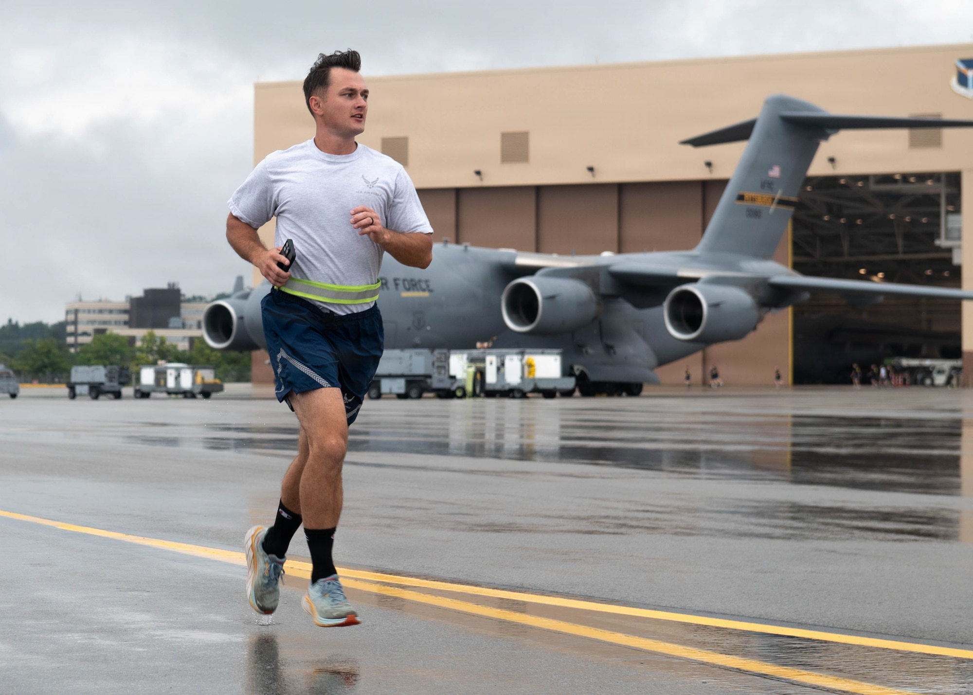 A Steel Airman assigned to the 911th Maintenance Group runs on the flightline as part of a morale event at Pittsburgh International Airport Air Reserve Station, Pennsylvania.