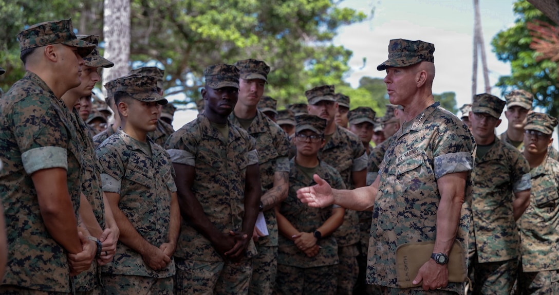 The 39th Commandant of the Marine Corps, Gen. Eric M. Smith, speaks with U.S. Marines stationed at Marine Corps Base Hawaii during a visit to MCBH, Aug. 10, 2026. The Commandant visited MCBH to record a birthday message for the annual Marine Corps Birthday Ball video, the engagement also provided Marines with an opportunity to speak directly with the Commandant and discuss their experiences and service in the Marine Corps. (U.S. Marine Corps photo by Cpl. MaKenna Hearne)