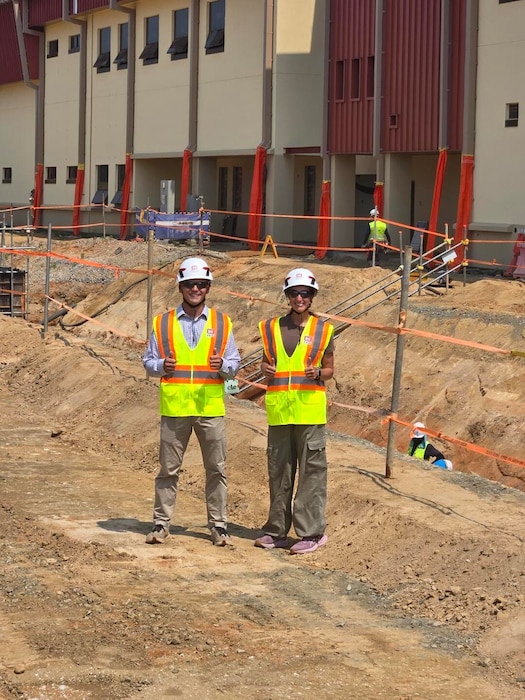 Cadets Jenna Lutz and McDowell Russ stand at an active construction site during their summer internship with the U.S. Army Corps of Engineers – Far East District at Camp Humphreys, Republic of Korea. The cadets participated in the USACE Cadet Program to gain experience in engineering operations, project management, and cross-disciplinary leadership. (U.S. Army photo by 1st Lt. Trenten Petersen)